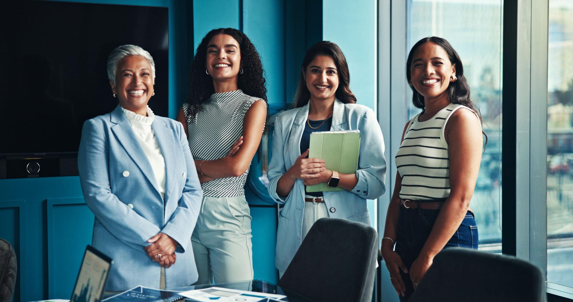 Business women, smile and happy with portrait at office with confidence, pride and partnership for company growth. People, employees and about us for career development, teamwork and collaboration